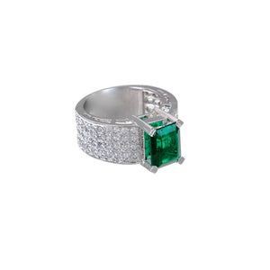 Handmade 22 karat gold cubic zirconia ring with an Emerald center stone. 