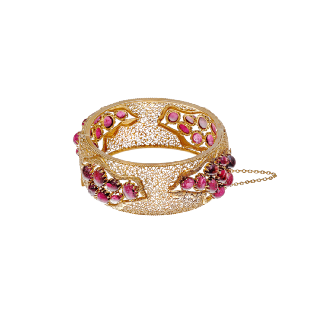 Handcrafted 22k gold kara with pink tourmaline in matte finish.