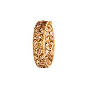 Mesh Indian kara finished in 22k gold with an antique polish for a vintage feel. 