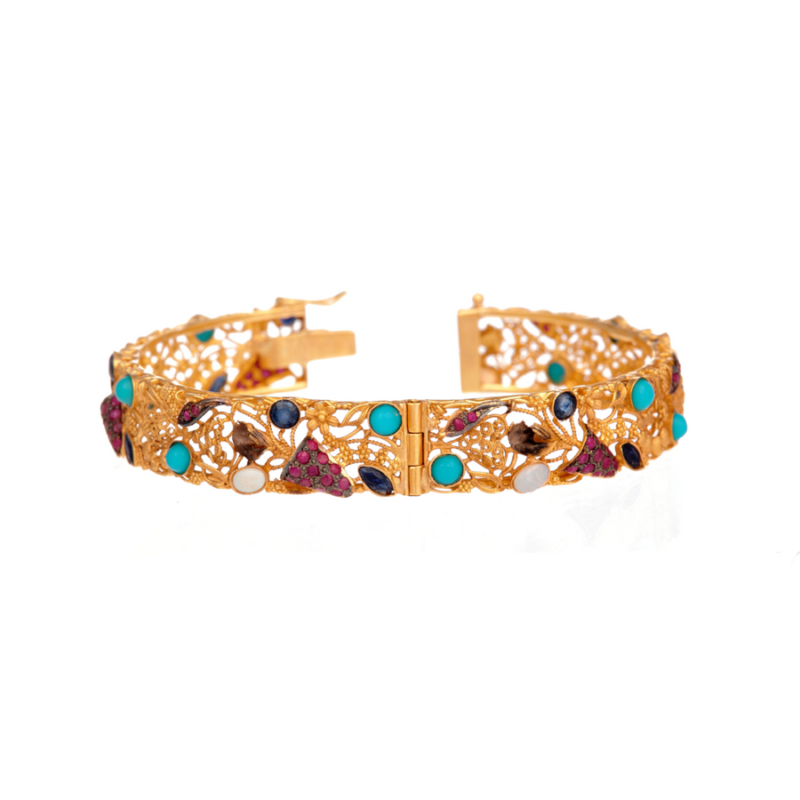 Intricate Kara studded with Turquoise, Rubies, Sapphires, and Opals made in 22k gold