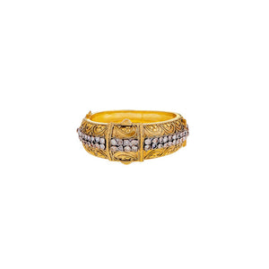 Trendsetting kara, handmade with filigree work and studded with Cubic Zirconia made in 22k gold