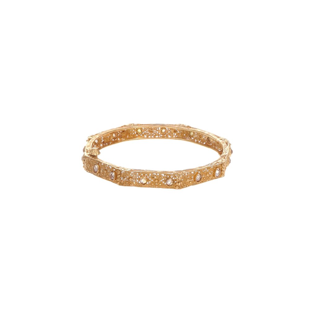 Dainty Kara with matte gold finish and studded with cubic zirconia made in 22k gold