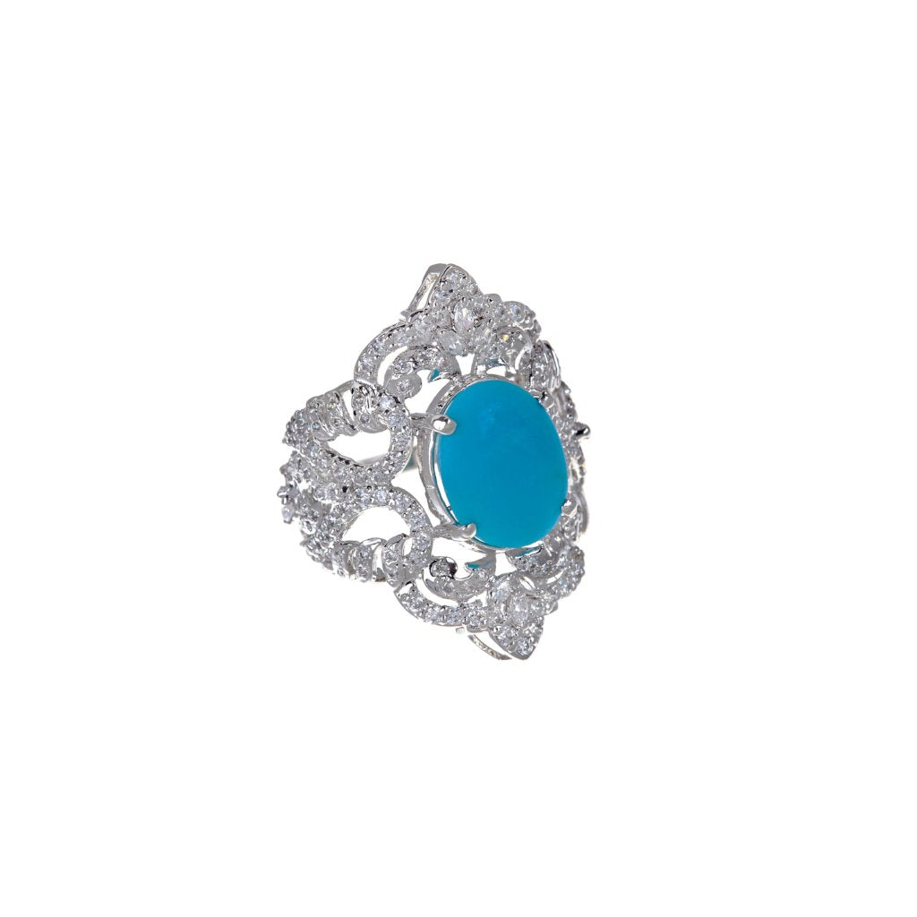 Handmade 22k gold Cubic Zirconia ring with an Turquoise center stone finished in Rhodium